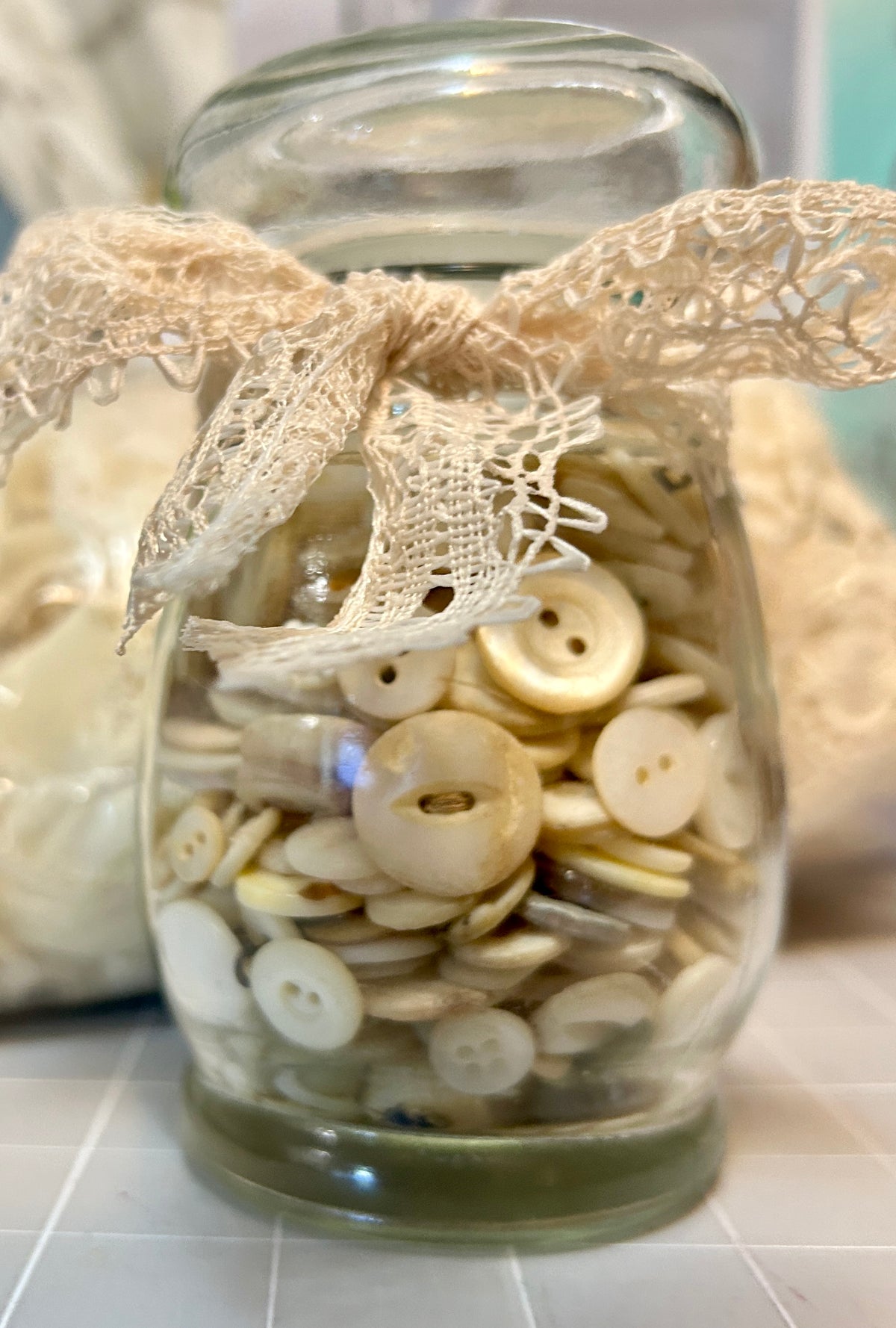 Small jar of vintage Mother of Pearl Buttons